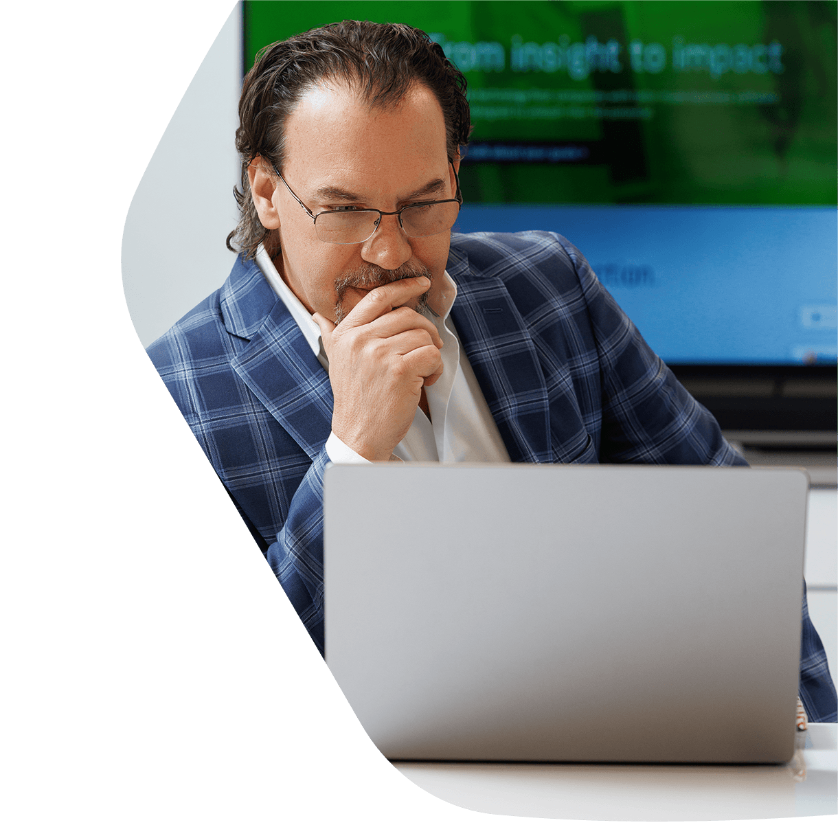 Calvin Fabre looking at laptop
